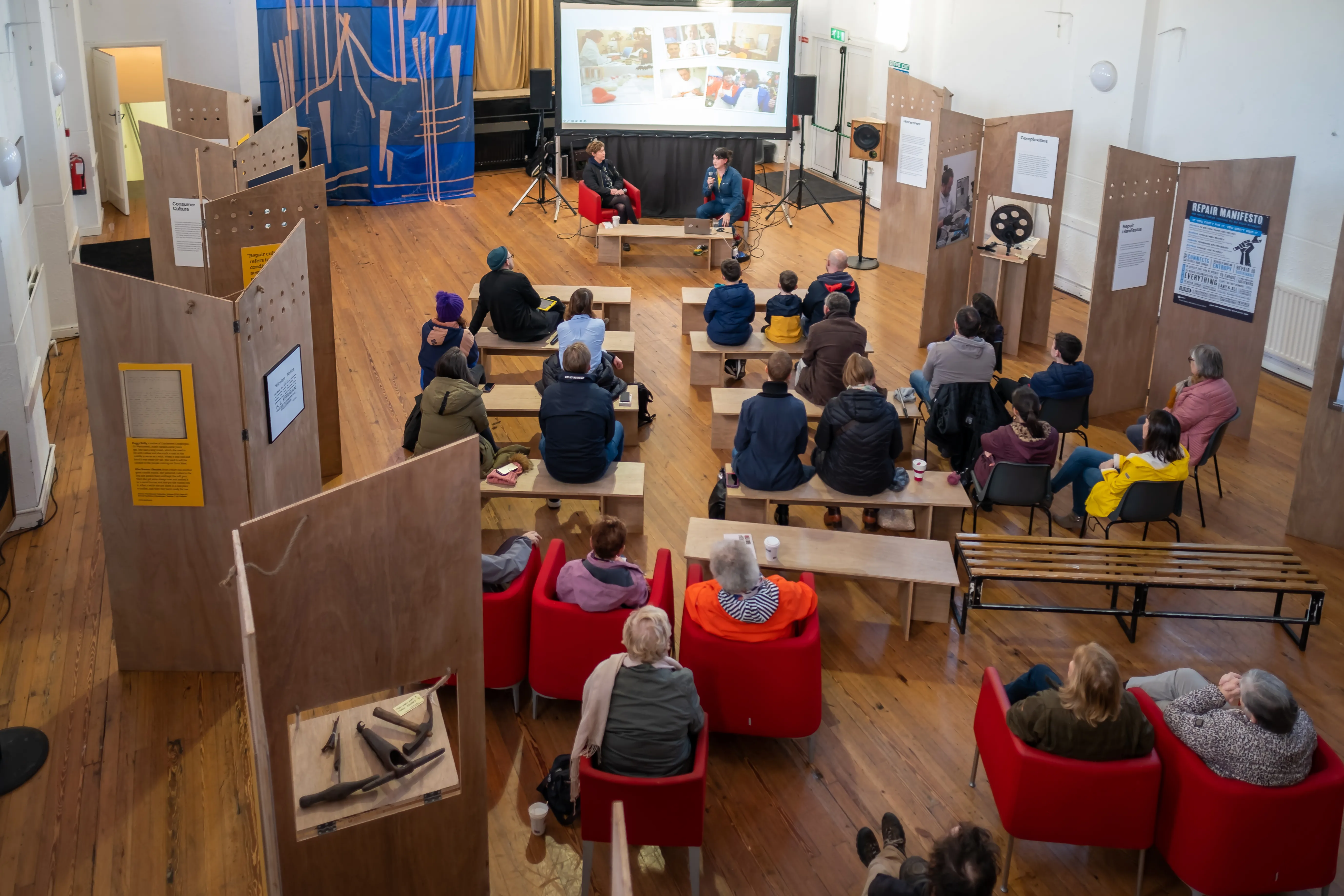 Sugru founder Jane Ni Dhulchaointigh in conversation at Repair Acts, Ireland, Caring for Repairing, Kilbeggan, 2022.