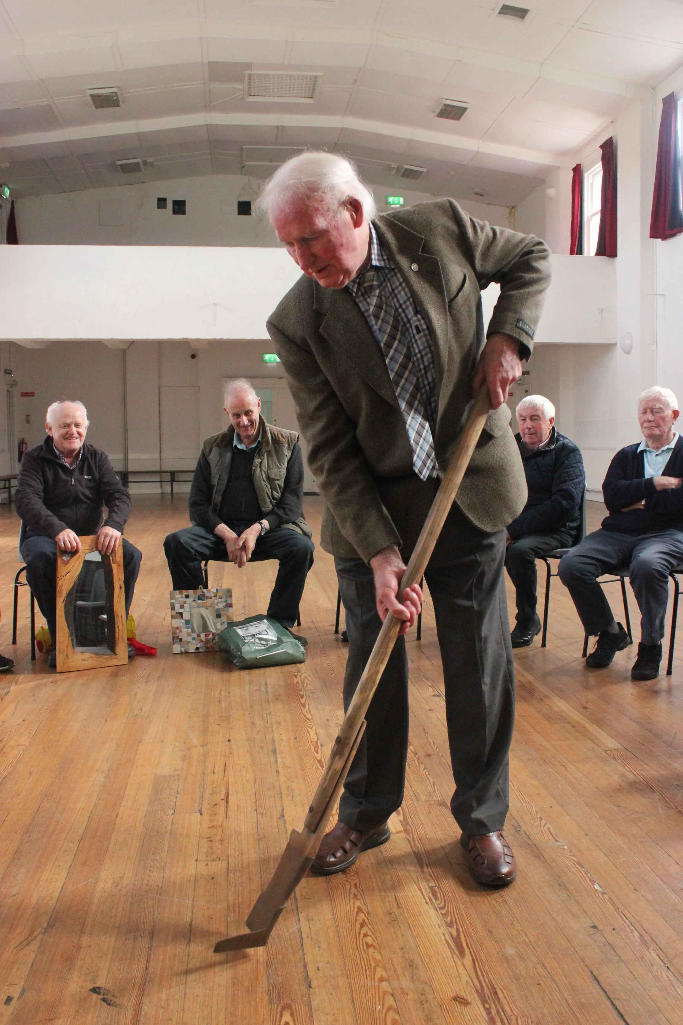 Christy Dalton, Sharing repair stories and mending tools for cutting the bog, Kilbeggan, May 2022.