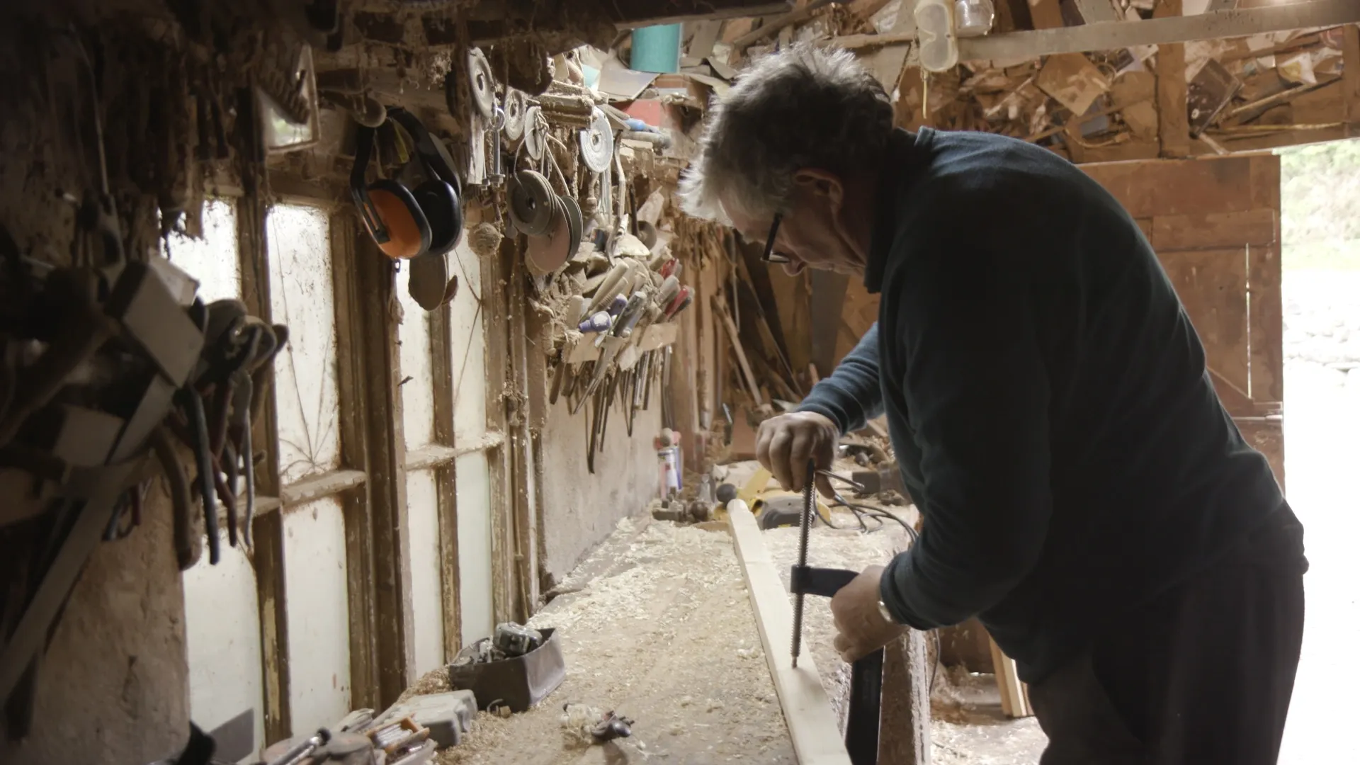 Boat maker and repair, John Joe Quigley, Inner Marina, Film still, Turning the Collar, 2022.